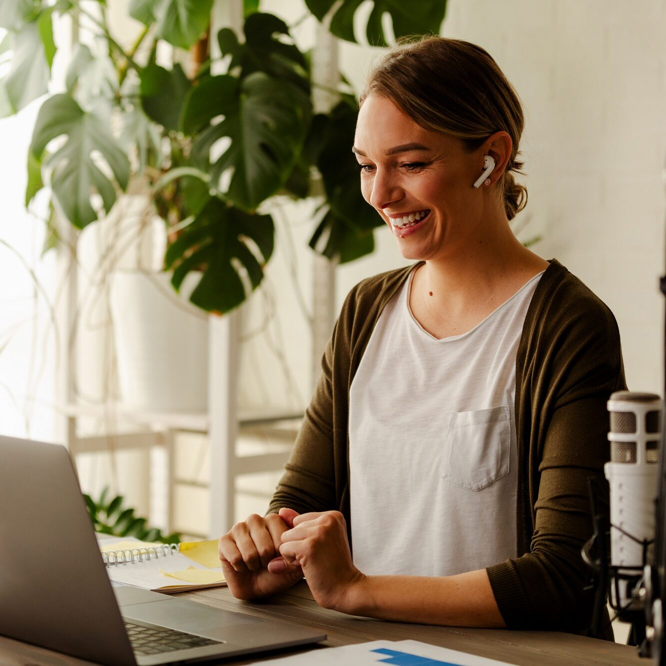 Businesswoman working from home making a video call. Female having a zoom call with colleagues.